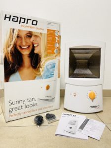Philips Hapro Summer Glow Gesichtsbräuner mit Verpackung und Inhalt